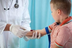 child draw blood virtual reality pain