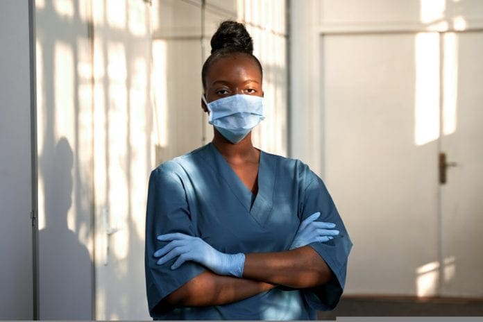 Confident,Young,Female,African,Scrub,Nurse,Wear,Blue,Uniform,,Face