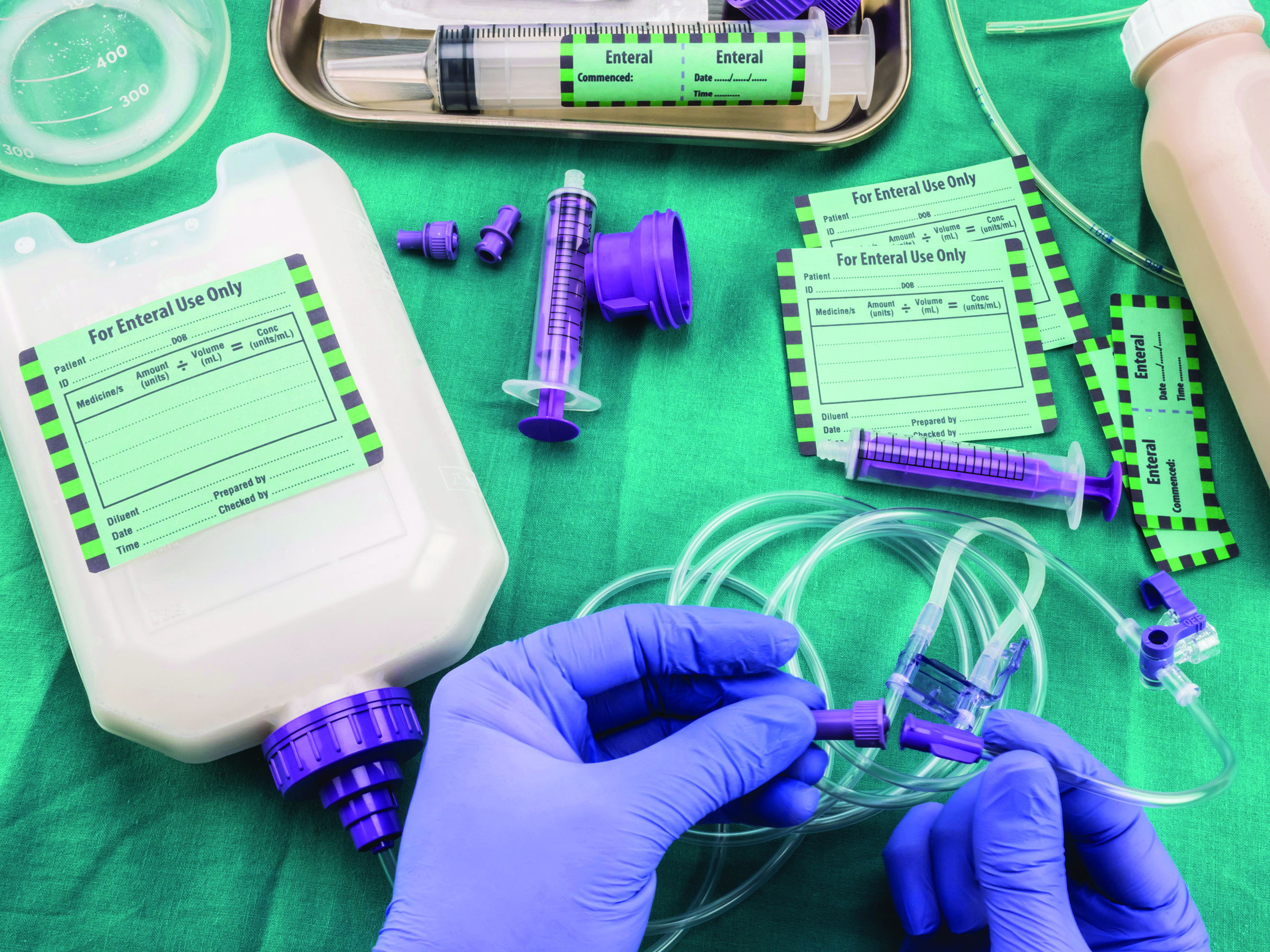 Nurse,Placed,Adapter,In,Equipment,Probe,Of,Enteral,Nutrition,,Palliative