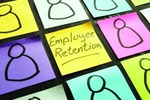 Employee,Retention,Sign,And,Figurines,On,The,Memo,Sticks.