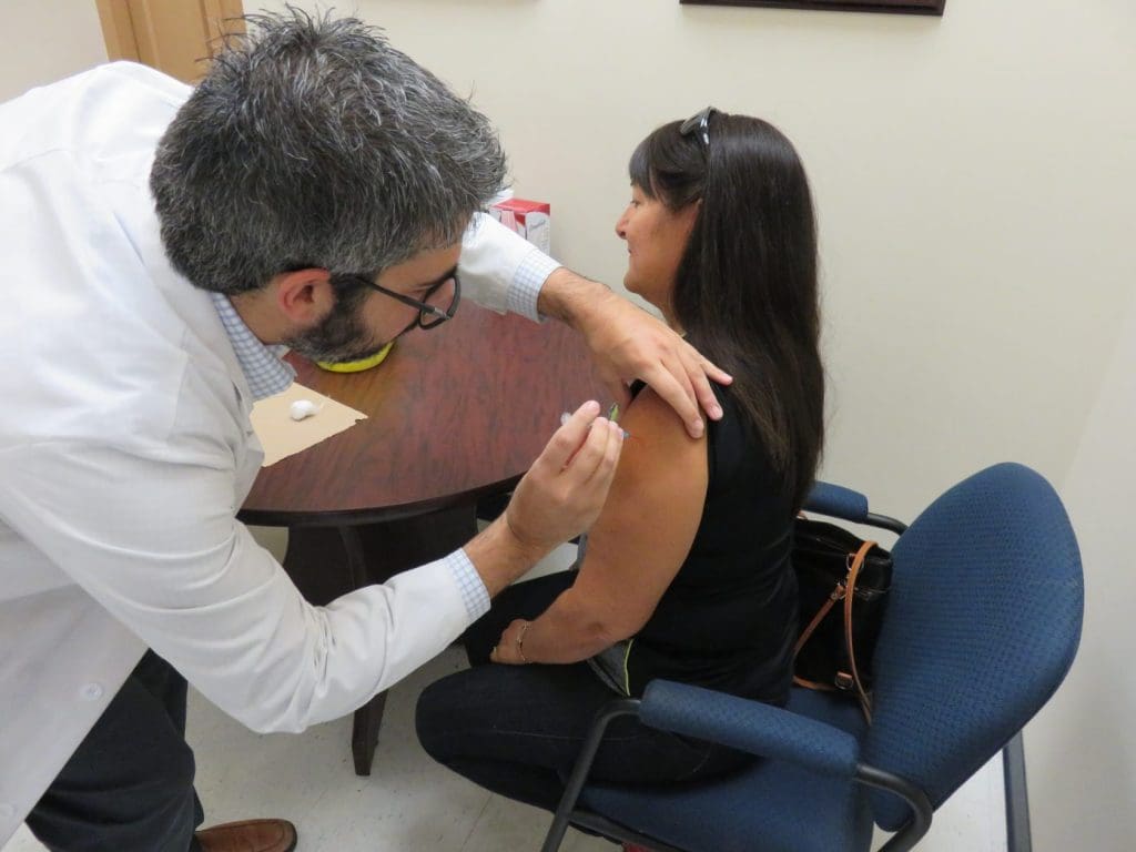 Patient getting an immunization