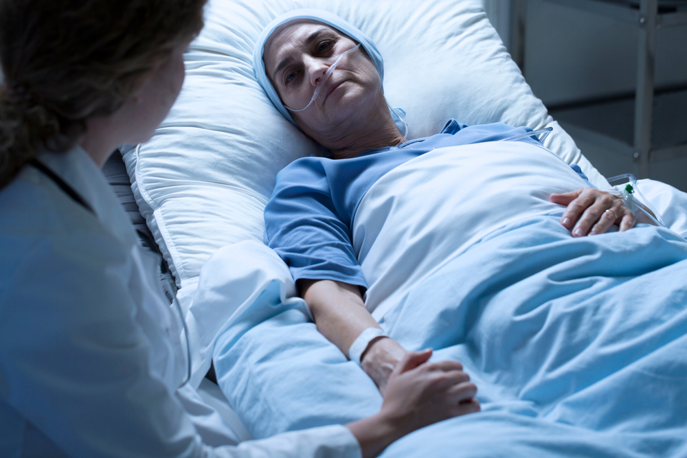 nurse with dying patient