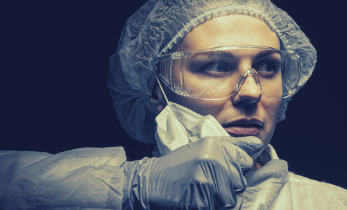 Nurse removing mask