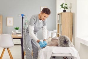 Nurse administering PIVC
