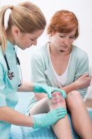 SANE nurse with patient