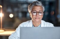 Nurse working on manuscript