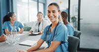 Young nurse at meeting