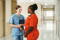 Two nurses talking